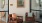 seating and a piece of art in a corner