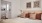 bedroom with bed and wall art