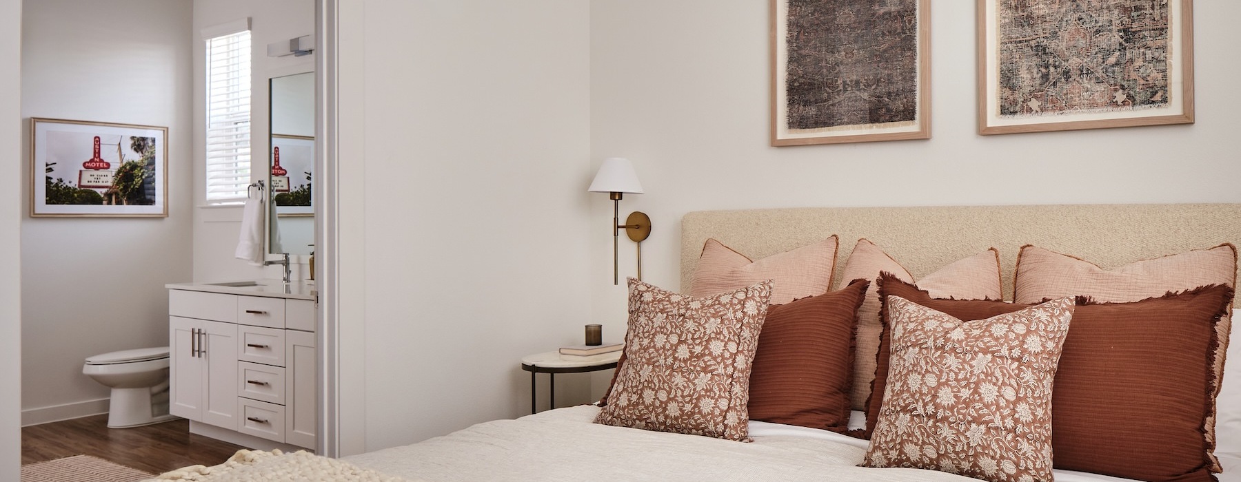 bedroom with bed and wall art