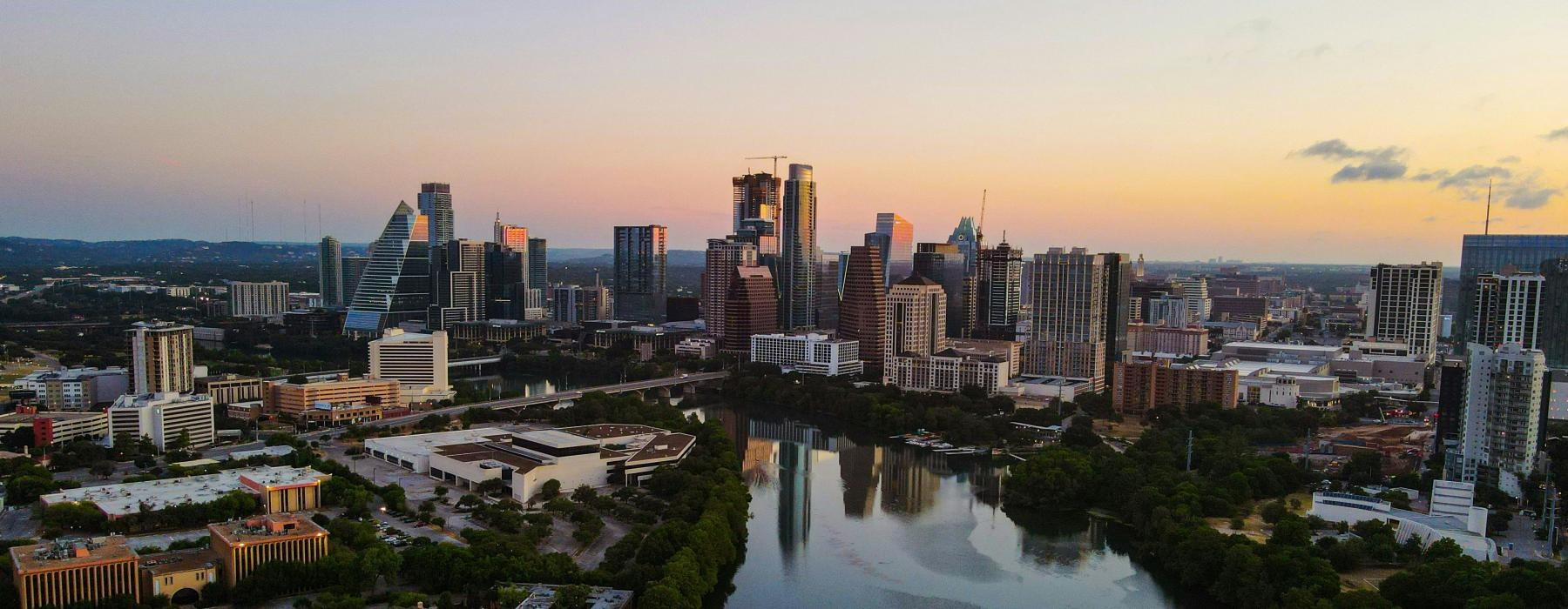 a river with a city in the background