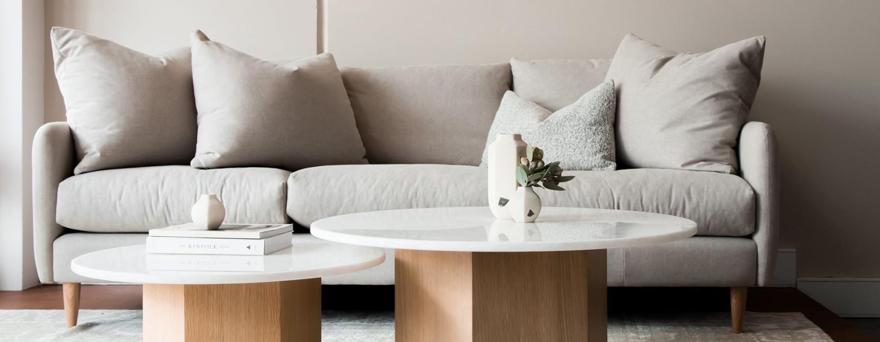 a white couch with a coffee table